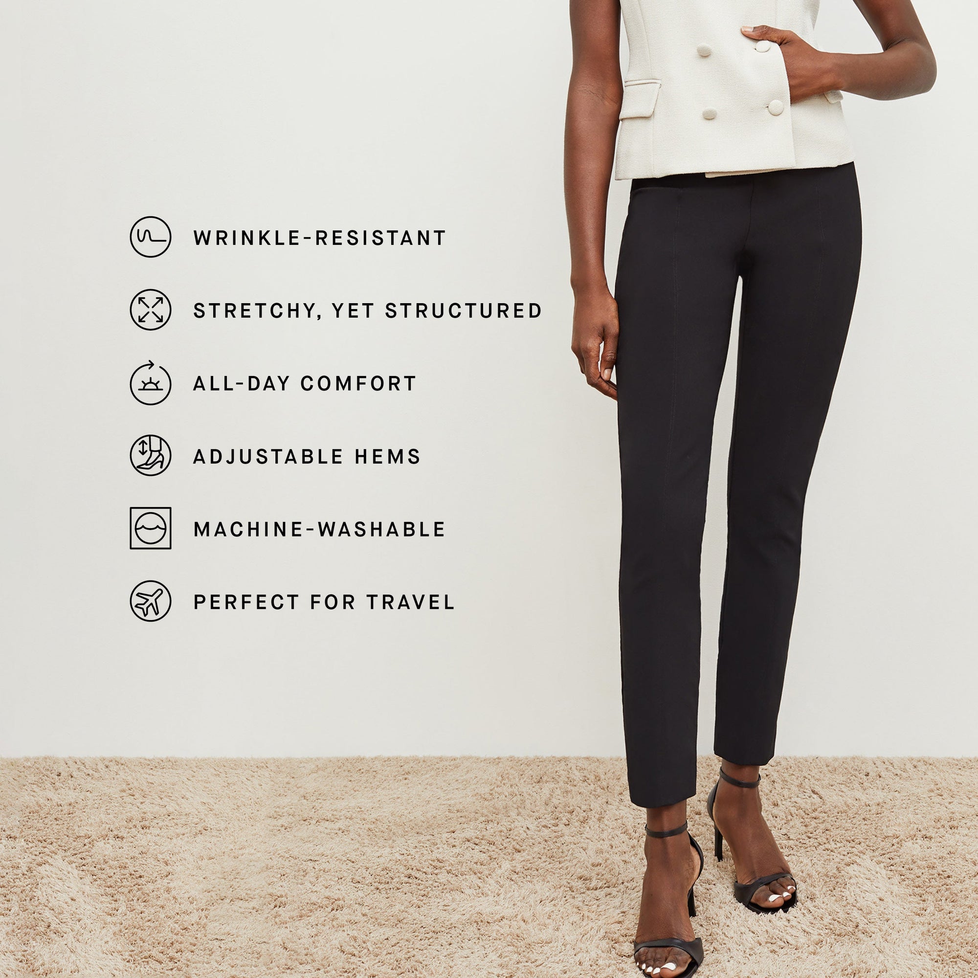 image of a woman wearing the foster pants in black with product features listed | Exclude