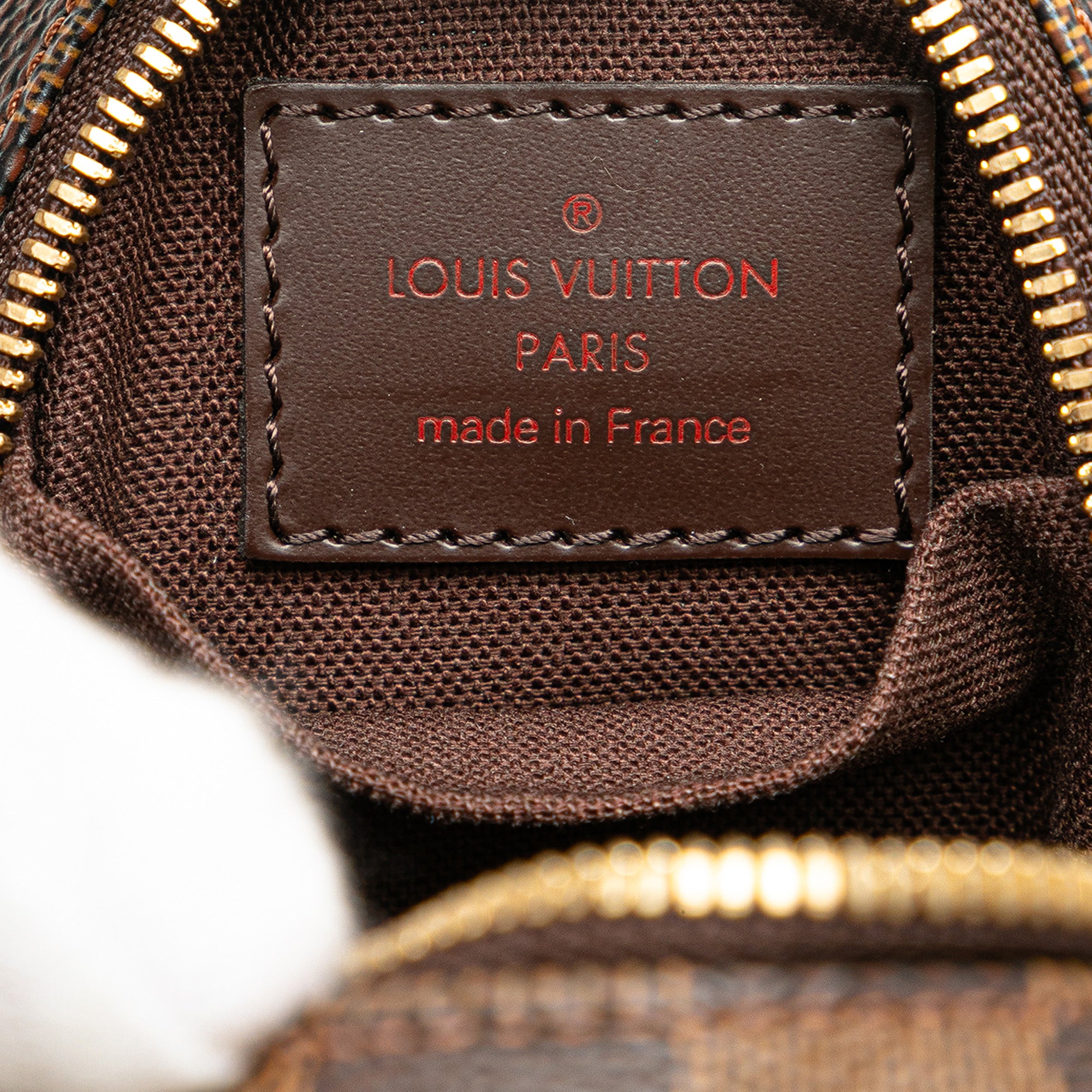Louis Vuitton | Pre-Owned Damier Ebene Etui Okapi PM | Brown
