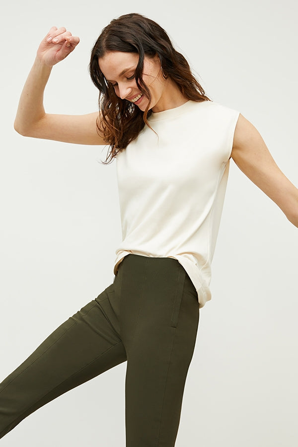 Detail image of woman wearing foster pant in dark olive | Exclude