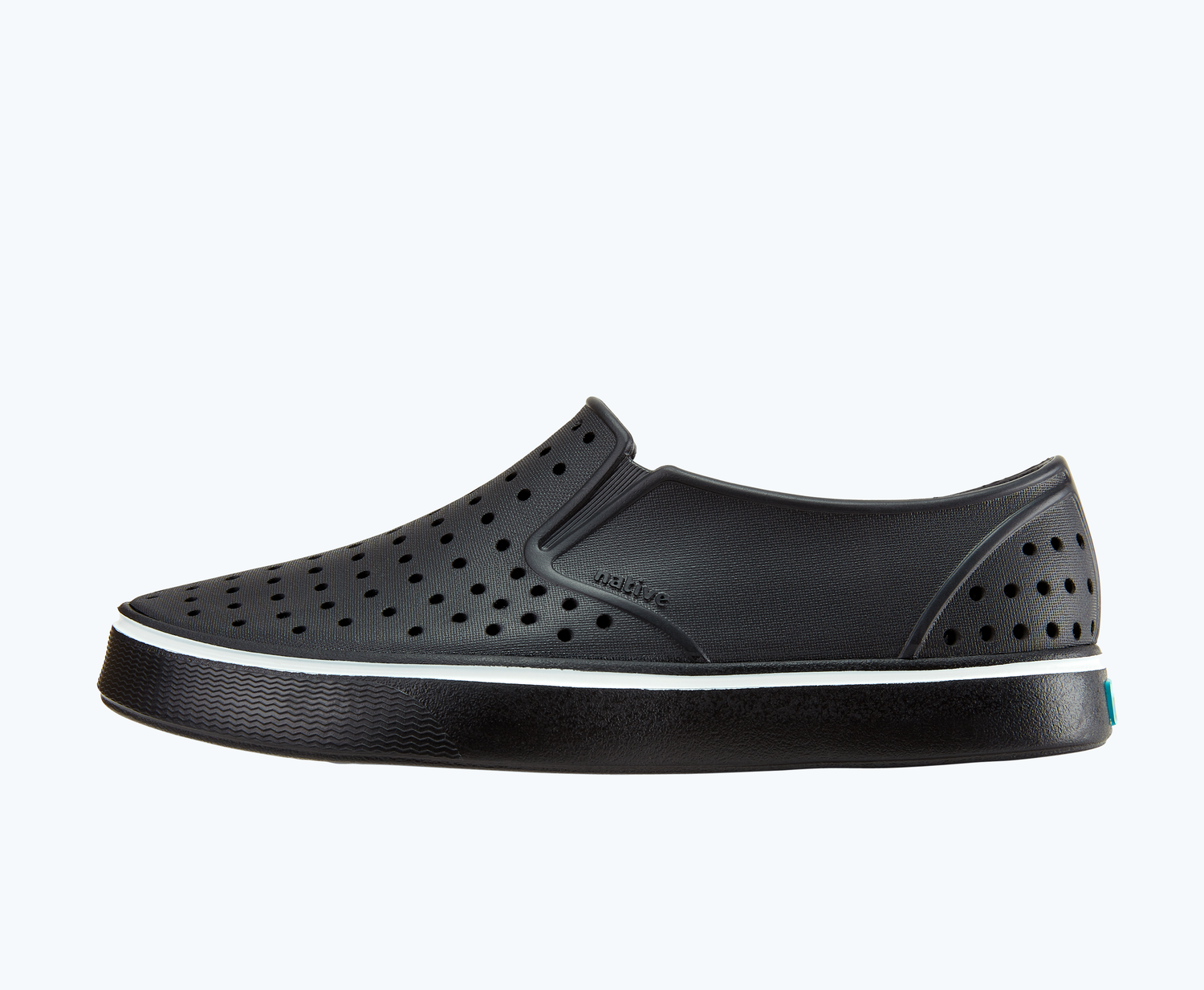 Side view of a Native Shoes Adults Miles | Jiffy Black/ Jiffy Black Footwear