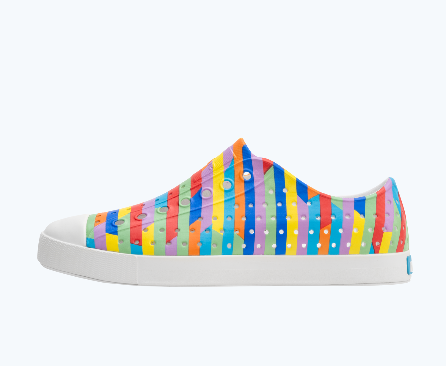 Side view of a Native Shoes Adults Jefferson Print | Shell White/ Shell White/ Rainbow Multi Stripe 2 Footwear
