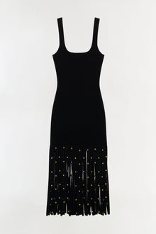 Black knit midi dress with square neckline, sleeveless tank straps, and gold stud embellishments on pleated hem.