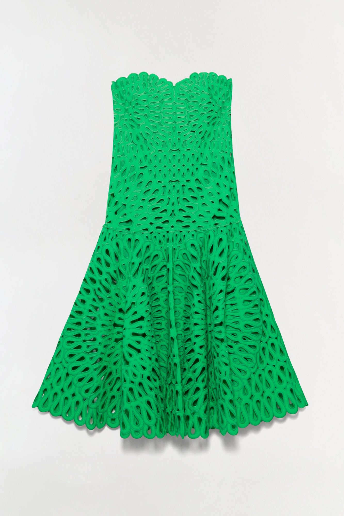 Bright green sleeveless midi dress with eyelet embroidered pattern and scalloped neckline and hem.