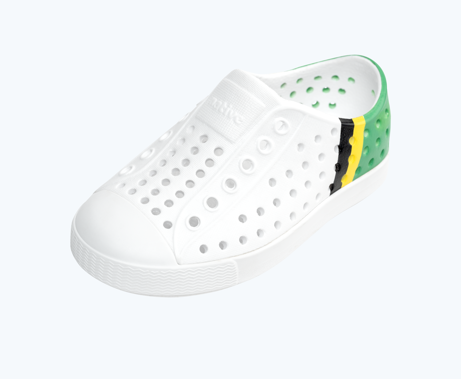 Angled view of a Native Shoes Kids Jefferson Block Kids | Shell White/ Shell White/ Jiffy Crayon Jolly Block Footwear