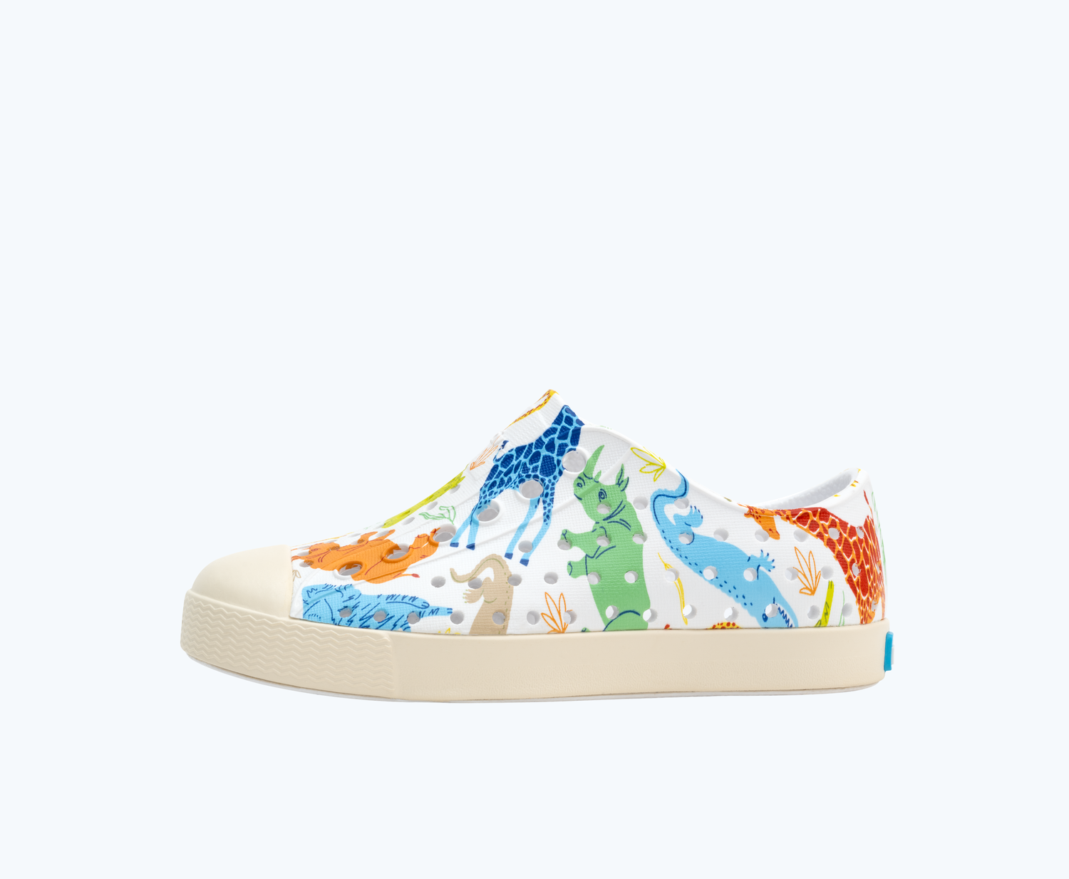 Side view of a Native Shoes Kids Jefferson Print Kids | Shell White/ Bone White/ Candy Safari Friends Footwear