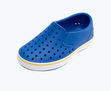 Angled view of a Native Shoes Kids Miles Kids | Uv Blue/ Shell White Footwear