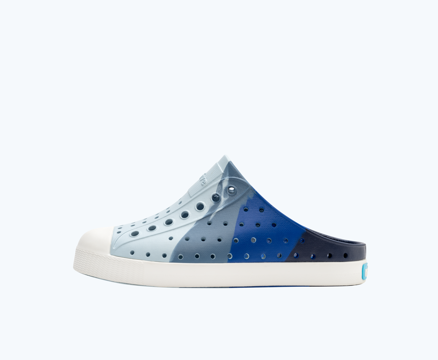 Side view of a Native Shoes Kids Jefferson Clog Marble Kids | Oasis Adventure Marble/ Shell White Footwear