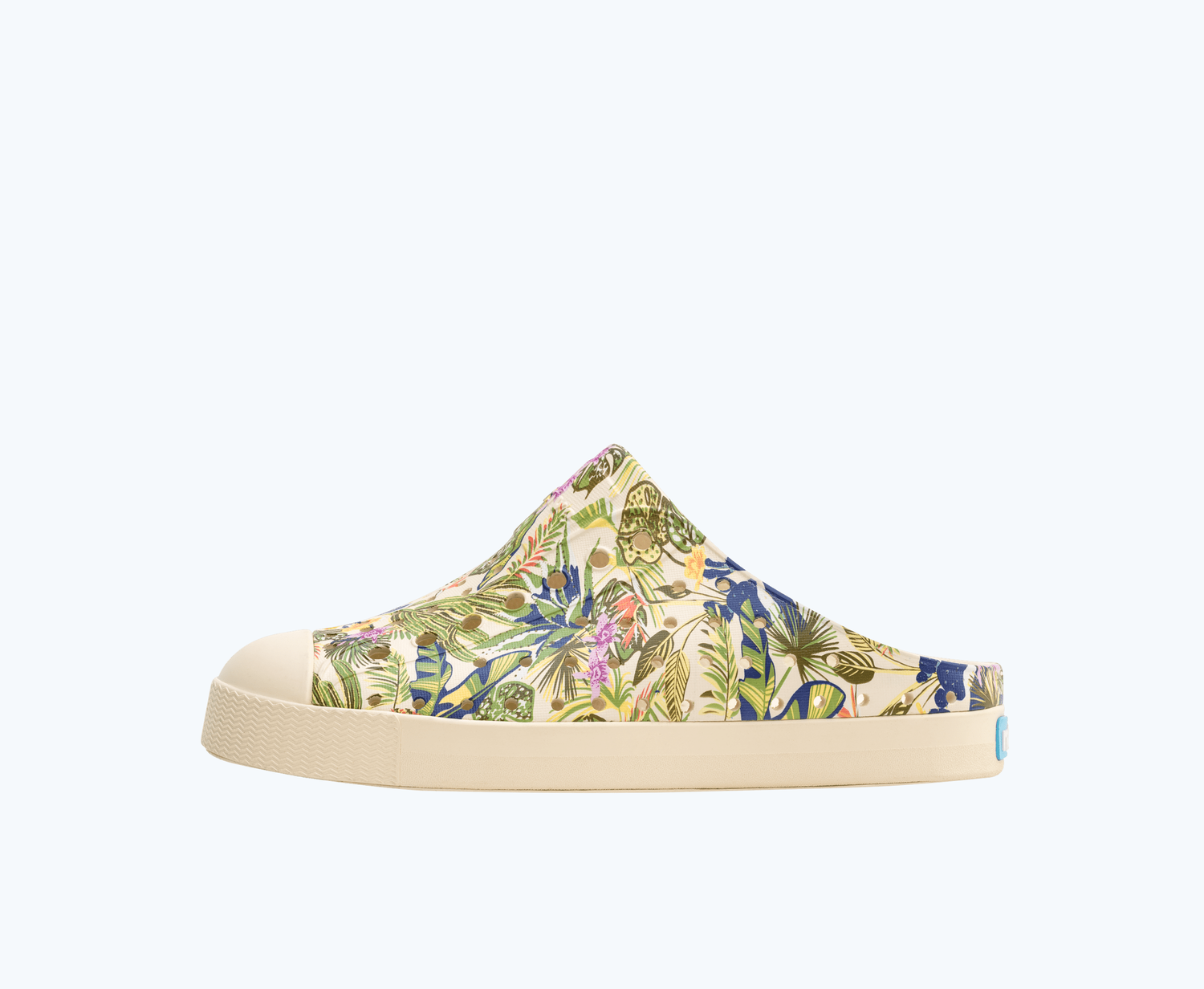Side view of a Native Shoes Kids Jefferson Clog Print Kids | Bone White/ Shell White/ Seaweed Ink Tropic Footwear