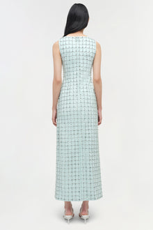 Light blue sleeveless midi dress with allover sequin embellishments, shown from back view on model.