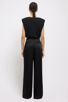 Black Mercer pant with high waist and wide leg, shown from back view on model.