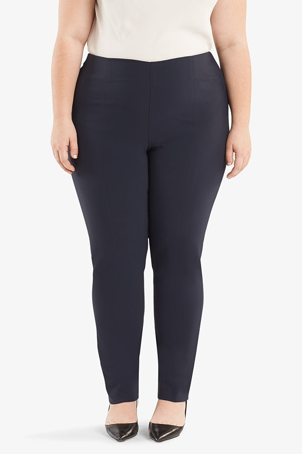 Front grid image of a plus size woman wearing the Foster pant in dark navy. | Plus | Exclude