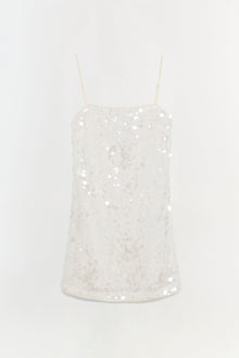 Ivory mini dress with sequin embellishments and thin spaghetti straps.