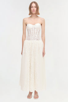 Ivory lace strapless dress with sweetheart neckline, corset bodice, and ankle-length skirt.