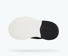 Bottom view of a Native Shoes Kids Phoenix Kids | Jiffy Black/ Shell White Footwear