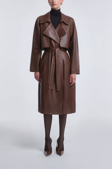 Model is wearing Nour Hammour Cisely Relaxed Leather Coat Canelle - Front Closed