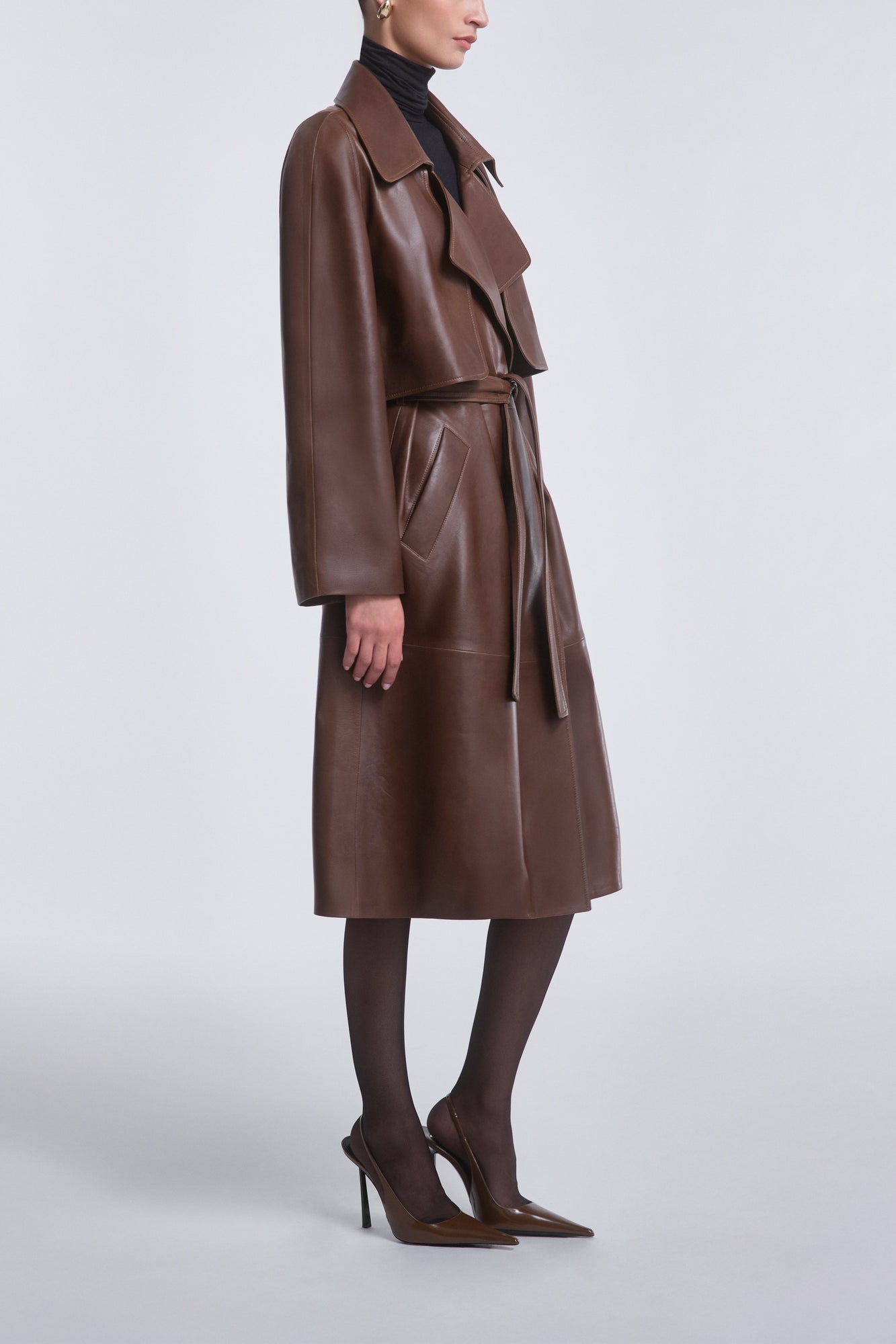 Model is wearing Nour Hammour Cisely Relaxed Leather Coat Canelle - Side