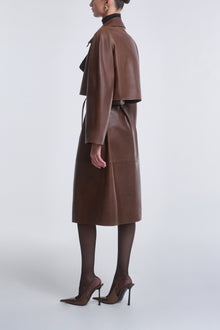 Model is wearing Nour Hammour Cisely Relaxed Leather Coat Canelle - Side