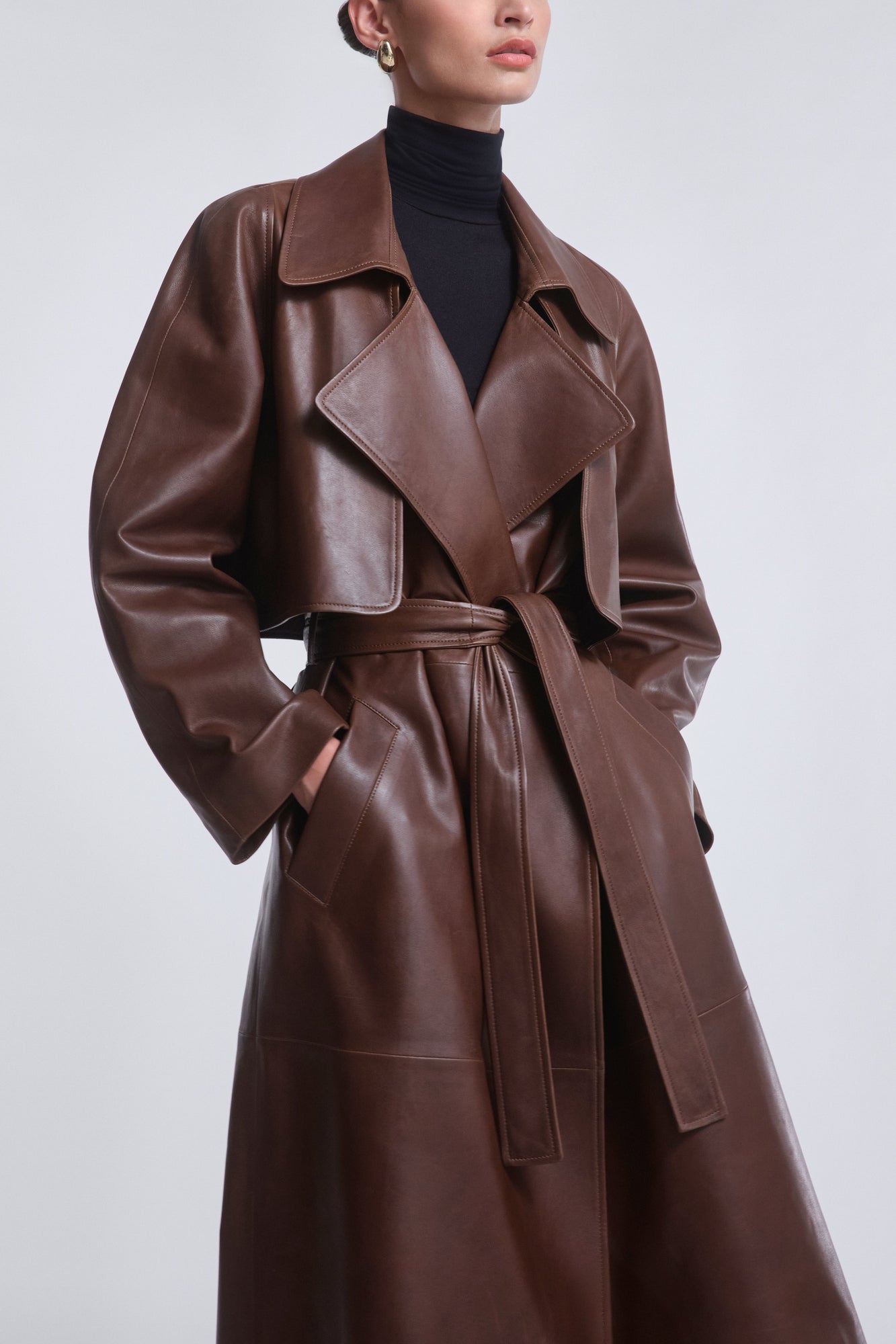 Model is wearing Nour Hammour Cisely Relaxed Leather Coat Canelle - Close Up