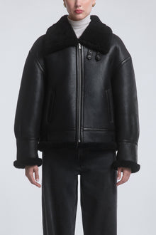 Model is Wearing the Nour Hammour Portia Modern Shearling AviatorJacket Black - Front