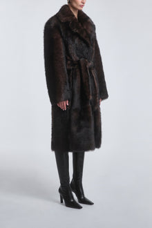 Model is Wearing the Nour Hammour Uma Plush Shearling Coat Brown Marble - Three Quarters