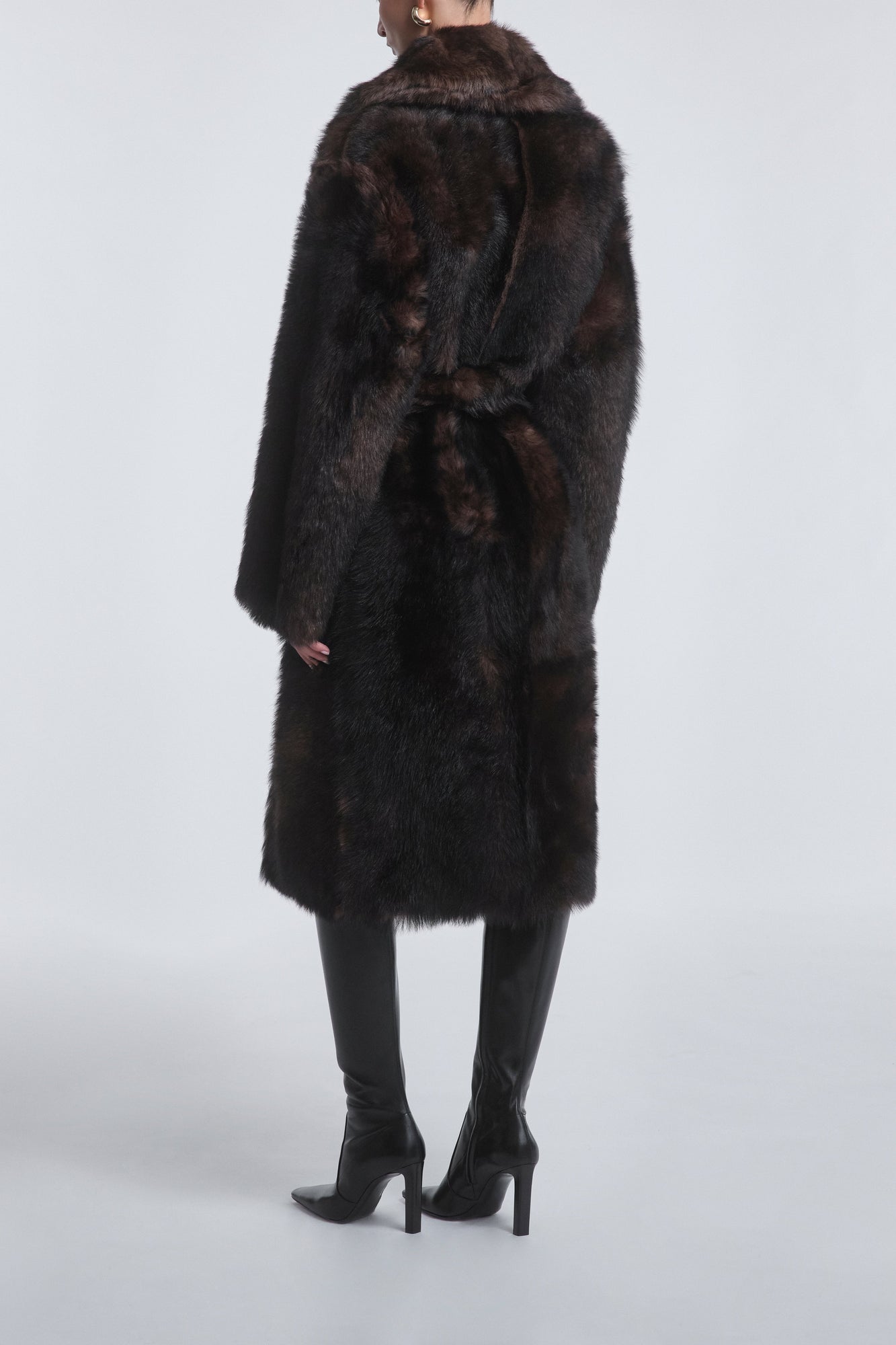 Model is Wearing the Nour Hammour Uma Plush Shearling Coat Brown Marble - Back