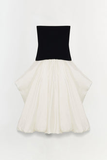 Black strapless bodice with cream pleated taffeta midi skirt.