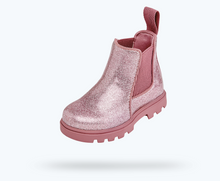 Angled view of a Native Shoes Kids Kensington Treklite Glittr Kids | Pink Glitter/ Temple Pink Footwear