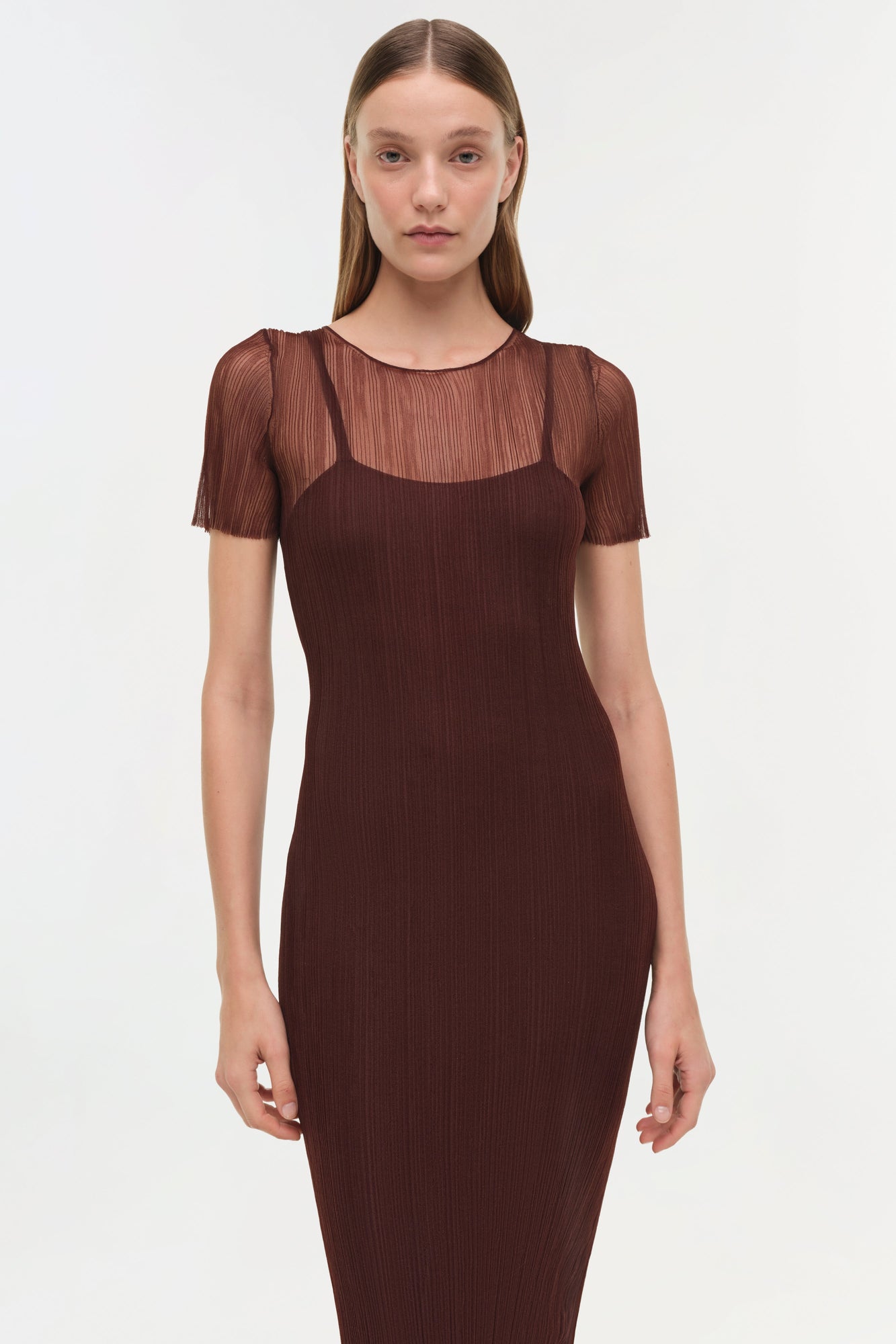Burgundy plisse midi dress with sheer short sleeves and ribbed texture throughout.