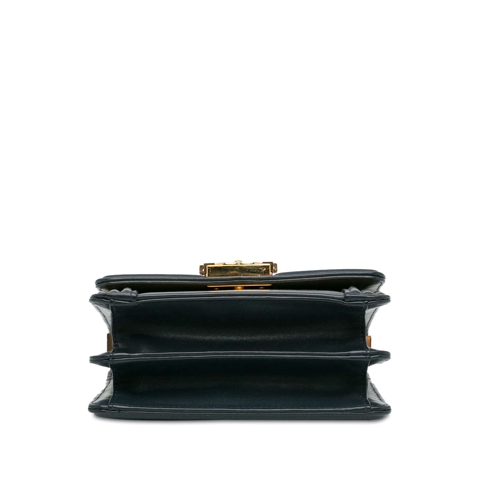 Chanel | Pre-Owned Metallic Lambskin Striped North South Boy Flap | Gold