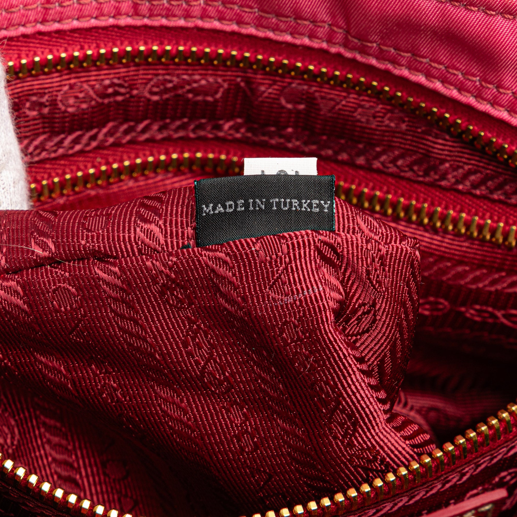 Prada | Pre-Owned Tessuto Zip Top Crossbody | Pink