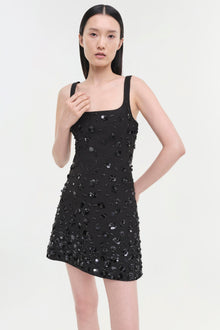 Black sleeveless dress with square neckline and all-over sequin embellishment.