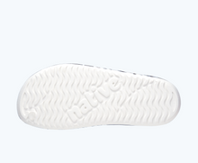 Bottom view of a Native Shoes Spencer Lx Print | Shell White/ Jiffy Black/ Grey Tie Dye Footwear