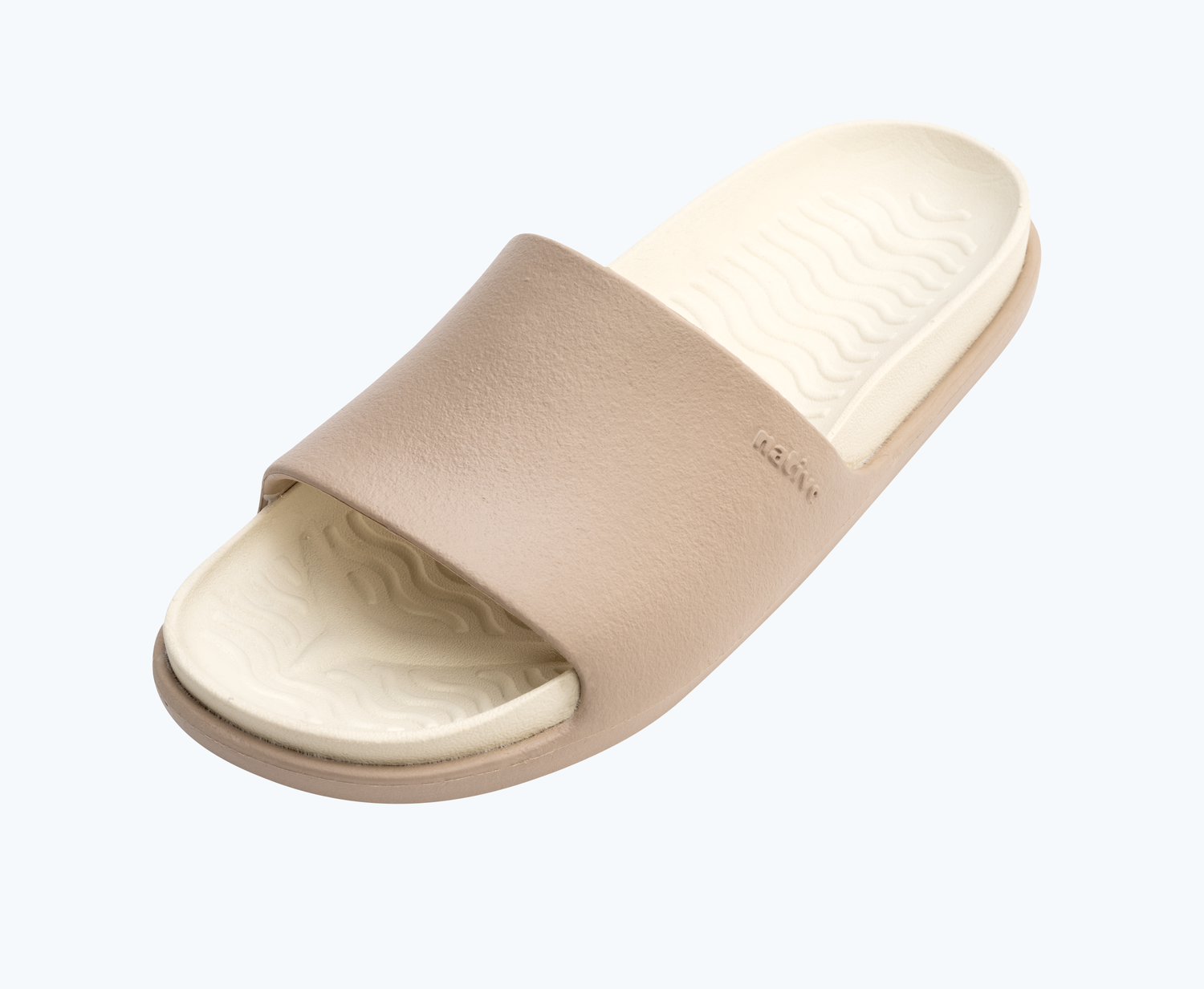 Angled view of a Native Shoes Spencer Lx | Flax Tan/ Bone White Footwear