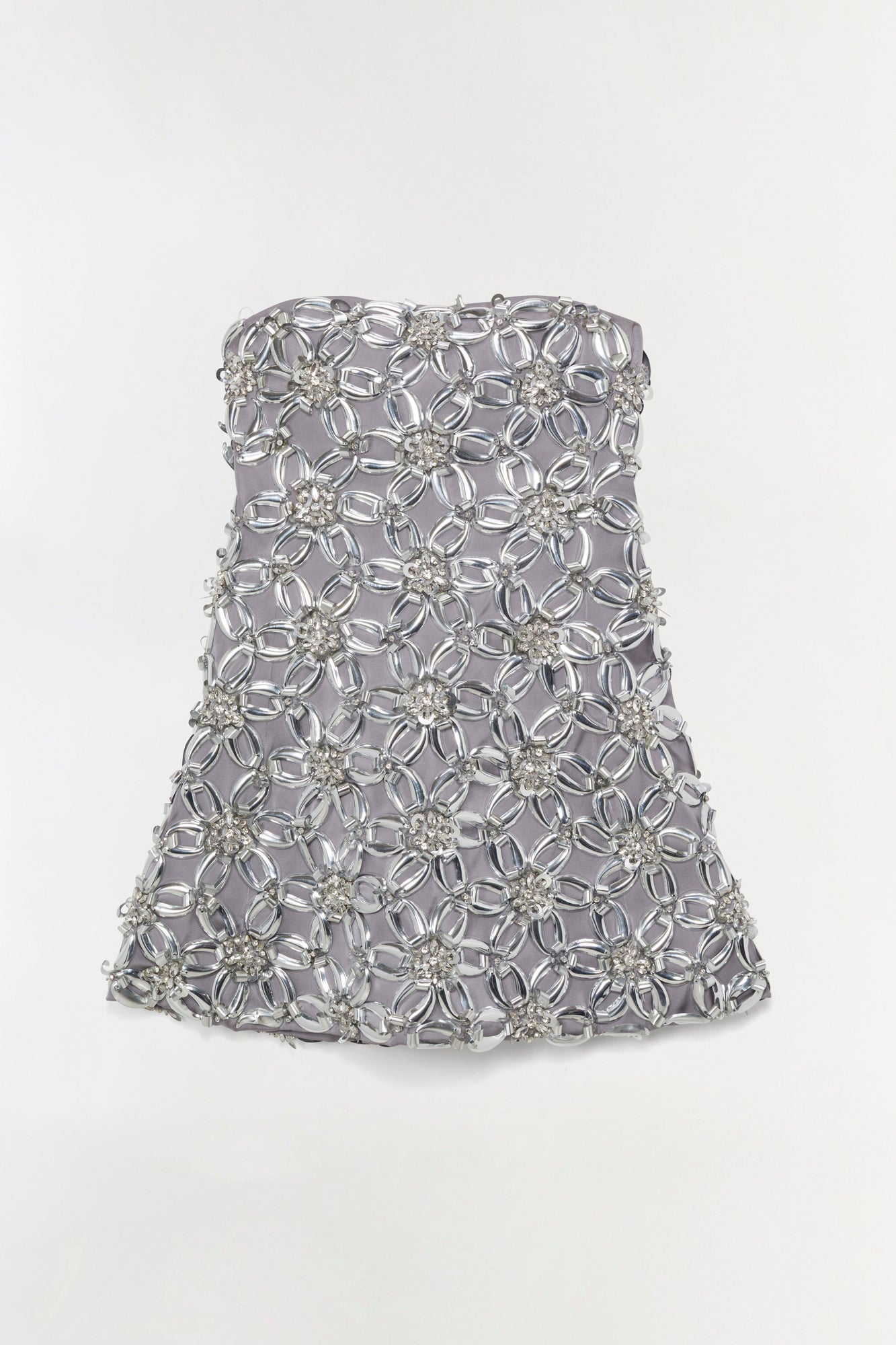 Gray strapless mini dress with crystal beads and geometric embellishments arranged in repeating floral patterns across the bo