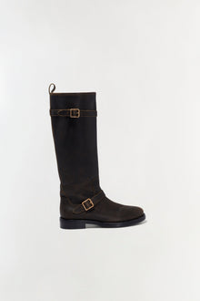 Black leather moto boot with two buckle straps and contrasting topstitching.