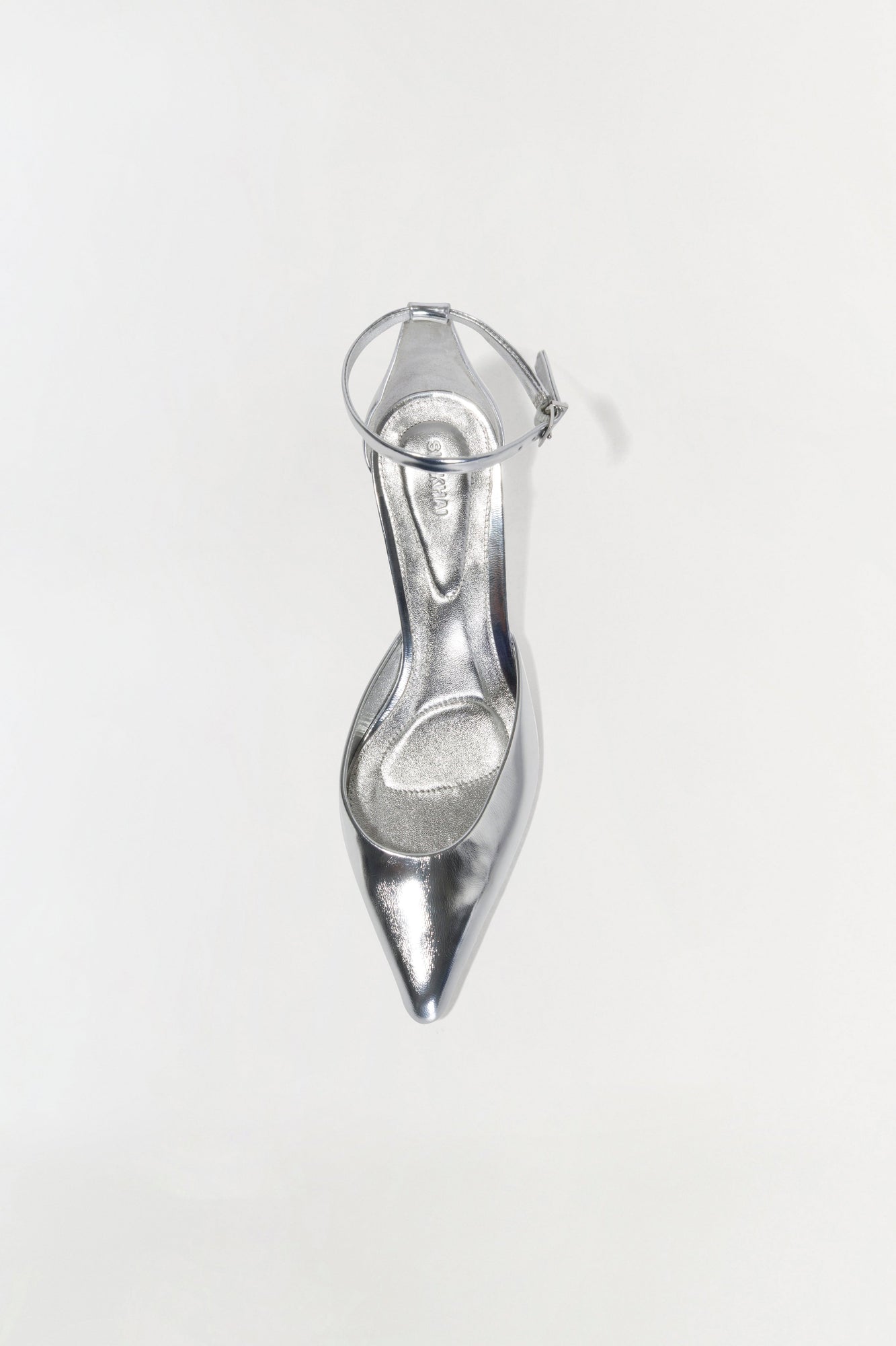 Silver metallic leather wedge shoe with ankle strap and pointed toe, shown from above.