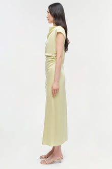 Pale yellow satin midi dress with cap sleeves and ruched side detail, shown on model from side profile.