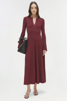 Burgundy ribbed knit midi dress with V-neckline, long sleeves, and A-line silhouette.