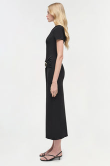 Black knit midi dress with short sleeves and side ruching detail, shown on model from side view.