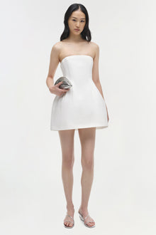White strapless mini dress with fitted bodice and flared skirt hem.