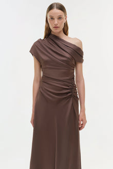 Brown satin midi dress with asymmetrical one-shoulder neckline and ruched side detail.