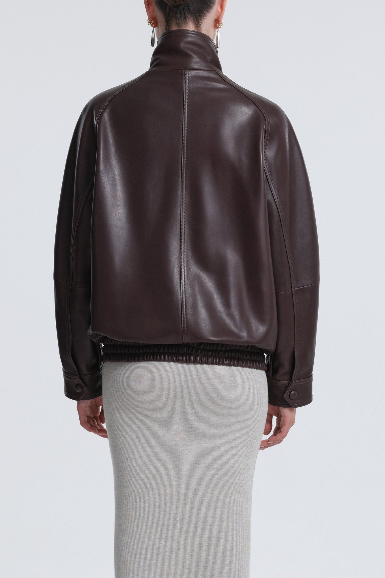 Model is Wearing Nour Hammour Ariste Fluid Leather Jacket Rich Brown - Back