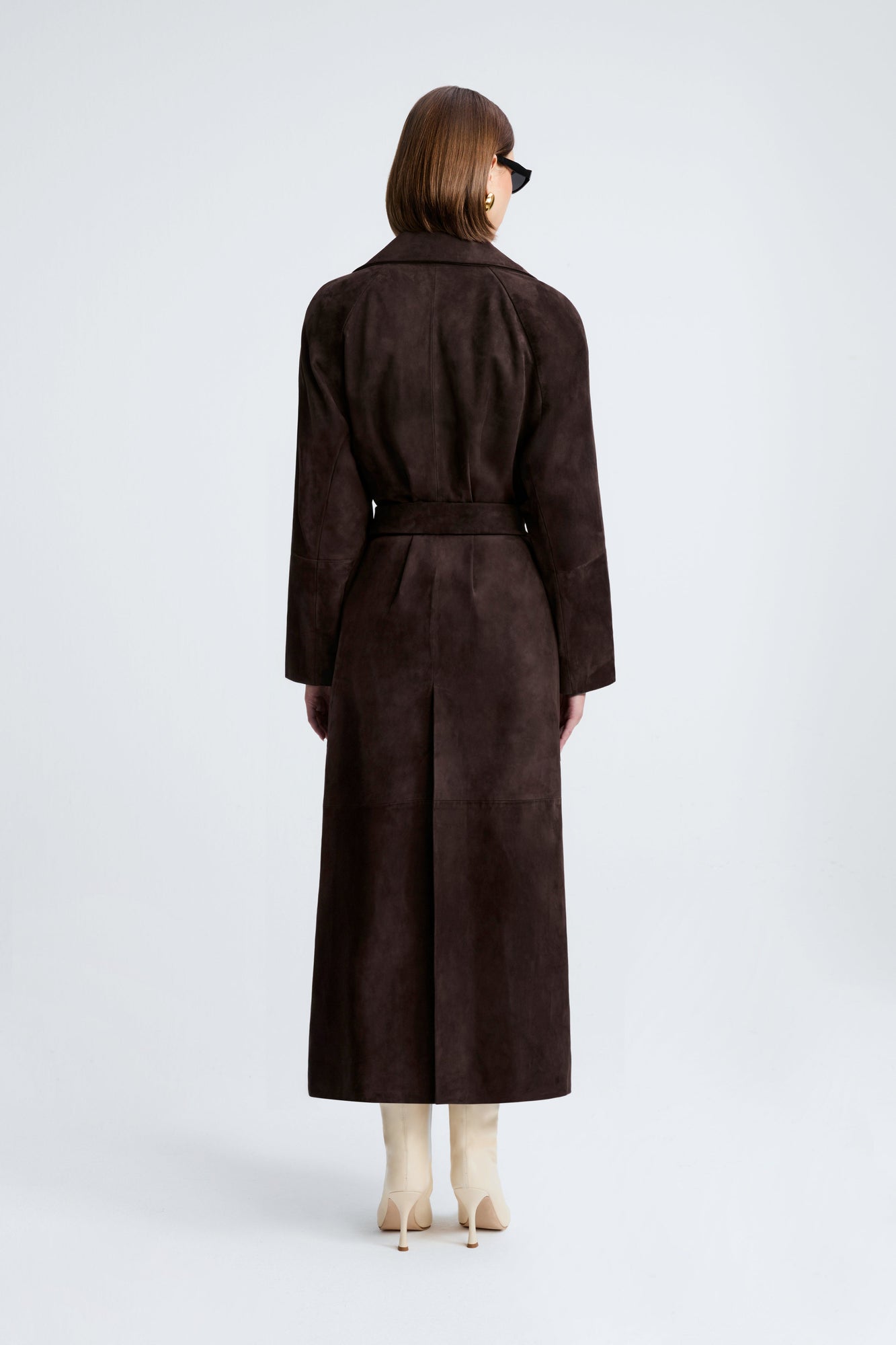 Model is wearing Nour Hammour Althea Belted Suede Coat Mocha - Back