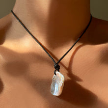 Keishi Pearl with Nylon Cord, styled on a neck