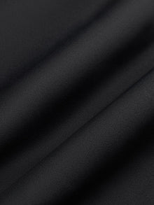 Close-up of Diamond Compression fabric in black showing smooth sculpting texture.