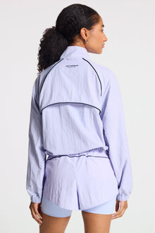 Bandier | Contrast Run Jacket | Baby Lavender/Navy Blazer