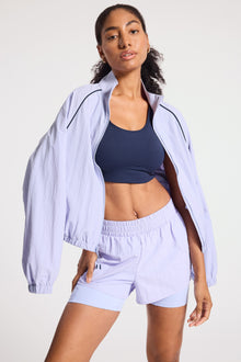 Bandier | Contrast Run Jacket | Baby Lavender/Navy Blazer
