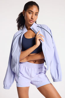 Bandier | Contrast Run Jacket | Baby Lavender/Navy Blazer