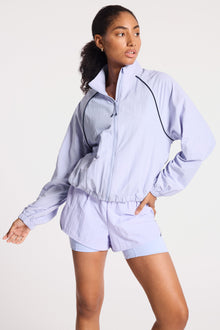 Bandier | Contrast Run Jacket | Baby Lavender/Navy Blazer