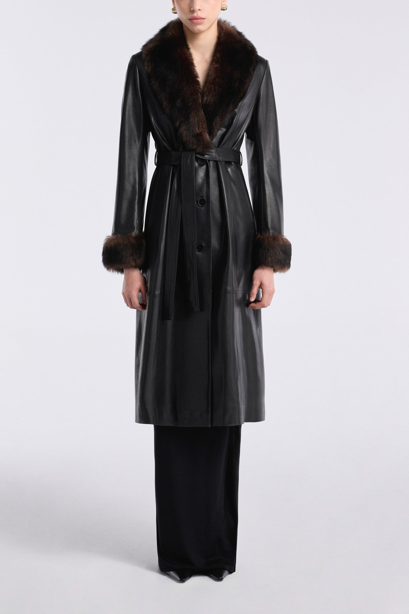 Model is wearing Nour Hammour Baez Luxe Leather Coat Noir Classique - Front